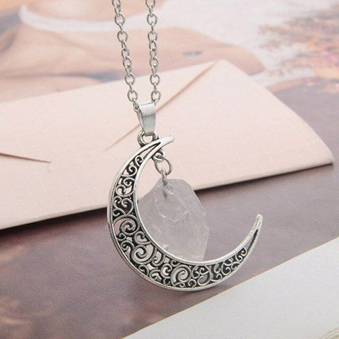 One Celtic Crescent Moon with genuine rock quartz and 50 cm