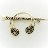 Irish  Bronze celtic brooch with a pin and torc design.