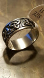 STAINLESS STEEL CELTIC TRINITY RING WITH  BLACK BACKGROUND
